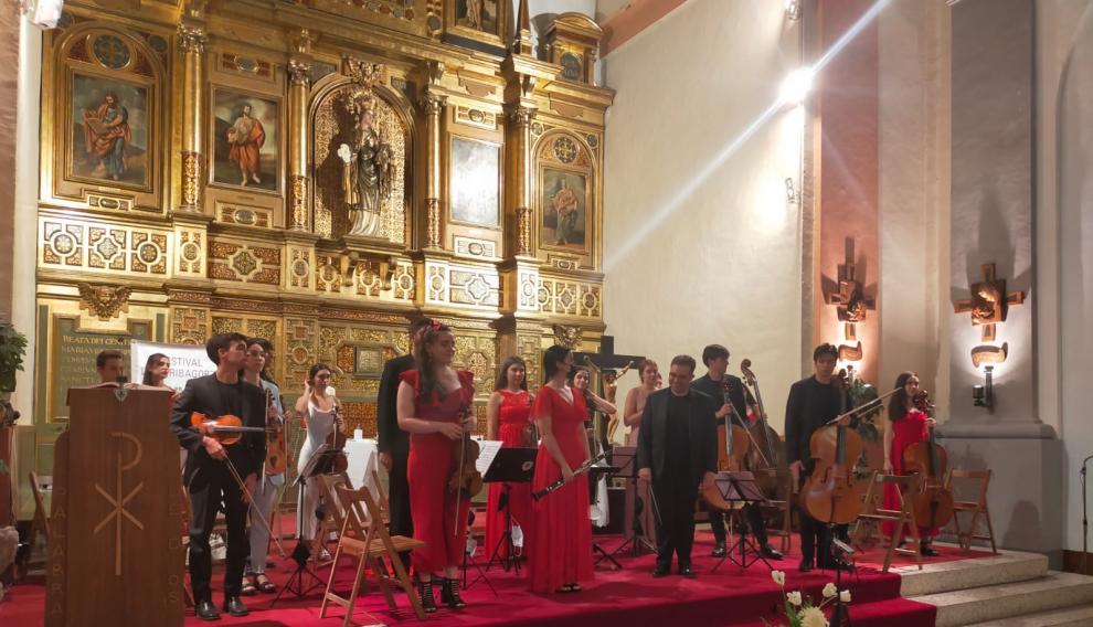 El público llenó el aforo permitido en el templo ribagorzano.