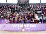 Las jugadoras del Esneca Fraga celebran el triunfo en la Champions League Women esta mañana.