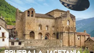 Cartel promocional de la Comarca de la Jacetania en Fitur con la iglesia de Siresa y la olla jacetana