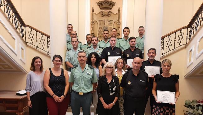Foto de familia tras la entrega de los diplomas en Huesca.