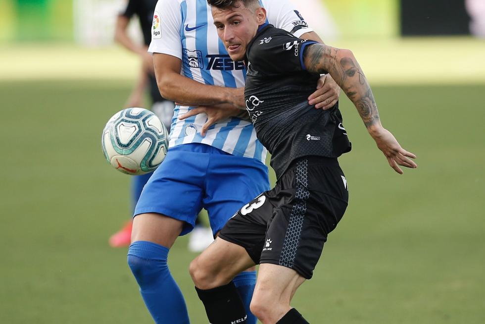 Málaga-Huesca