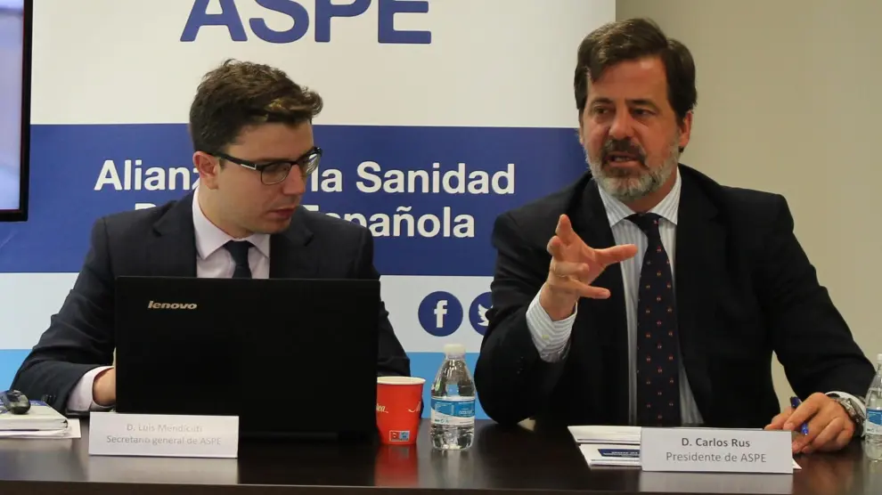 El secretario general, Luis Mendicuti, y el presidente de ASPE, Carlos Rus.