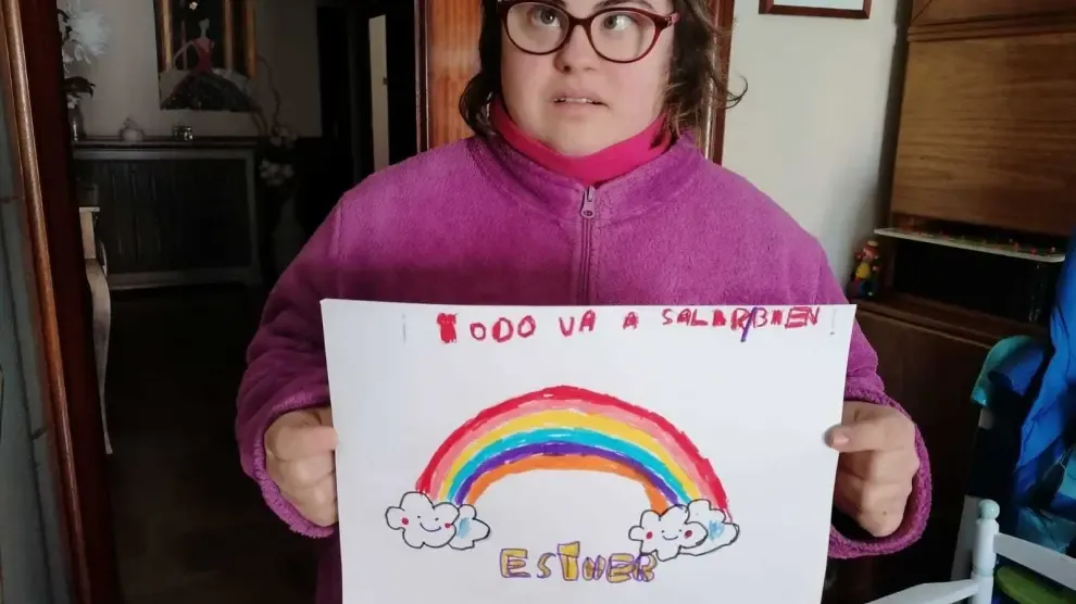 Jóvenes de Down Huesca animan con sus arcoíris a quedarse en casa