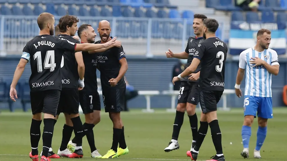 El Huesca gana en Málaga y reafirma su candidatura al ascenso (1-3)