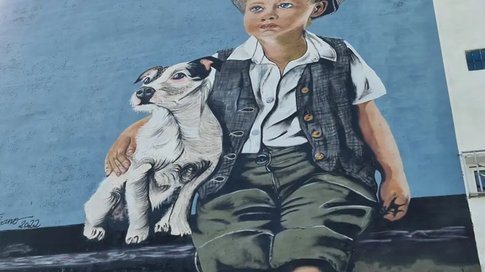 Txus Montejano ha pintado un niño con un perro.