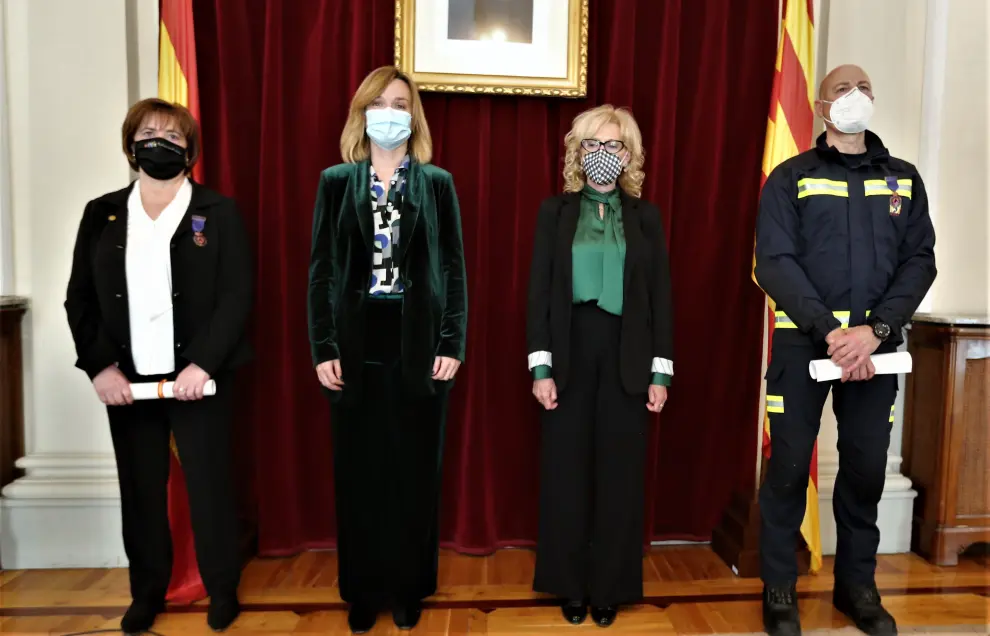 Pilar Guerrero y Joaquín Abiol reciben las Medallas al Mérito de la Protección Civil en Huesca.