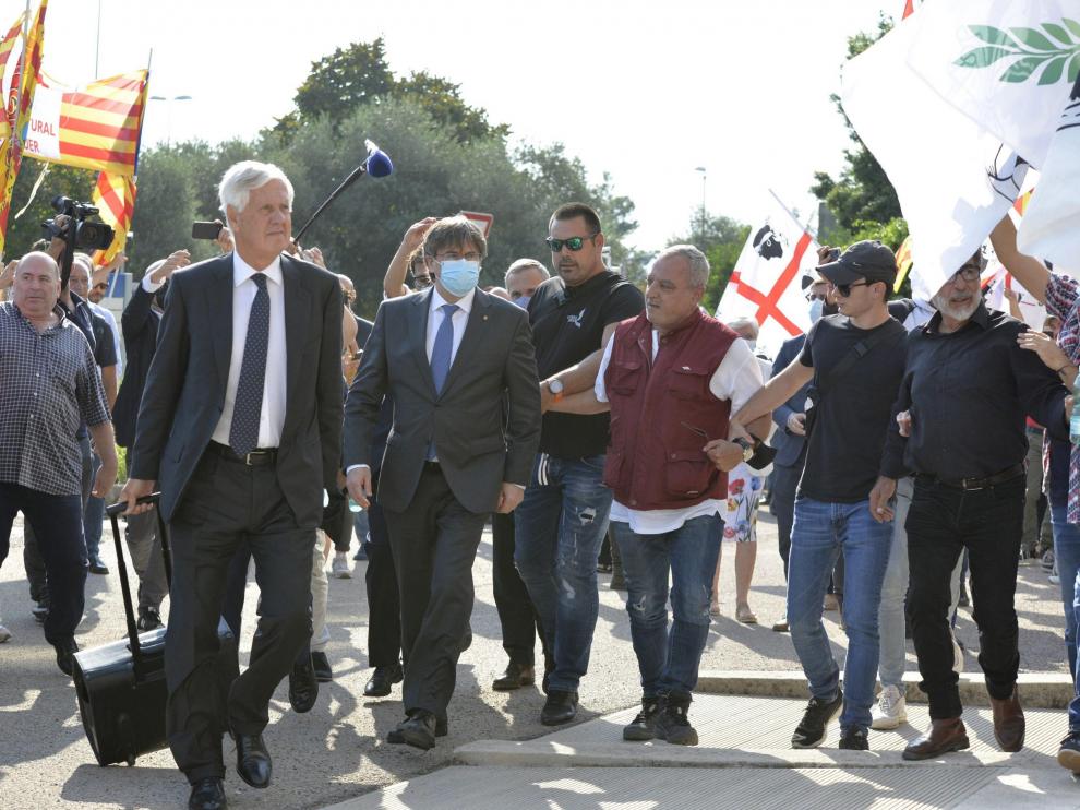 Llegada del expresidente catalán al tribunal que lleva su caso.
