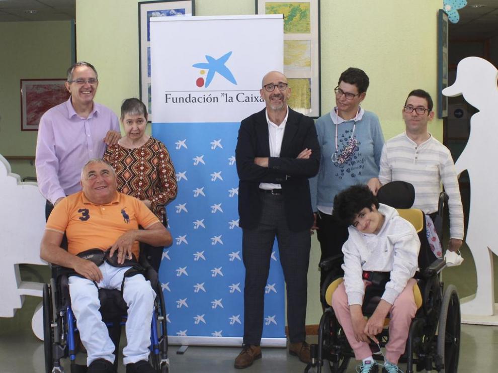 Colaboración La Caixa Caixabank Marcha Aspace 2