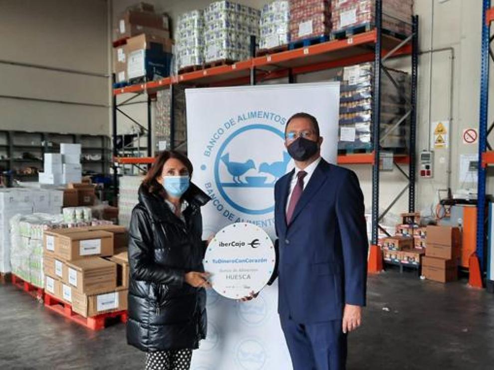 El acto ha tenido lugar en el Banco de Alimentos de Huesca