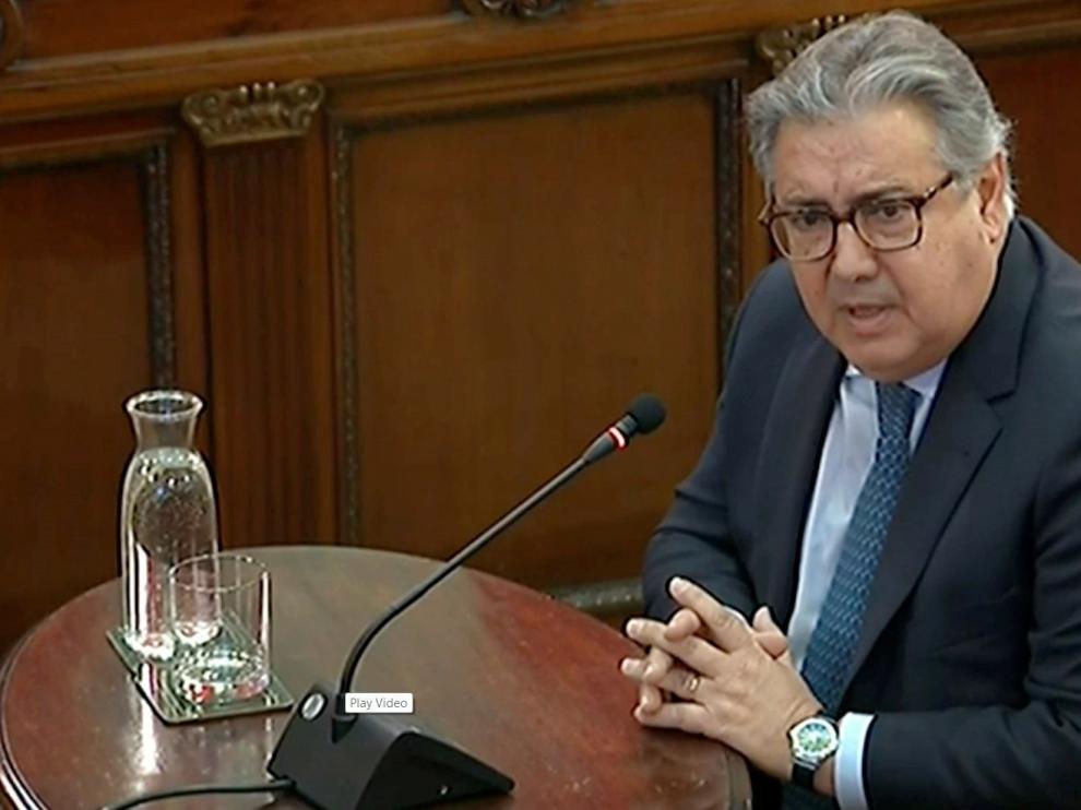 Zoido se desmarca de las cargas y culpa a los Mossos de no cumplir
