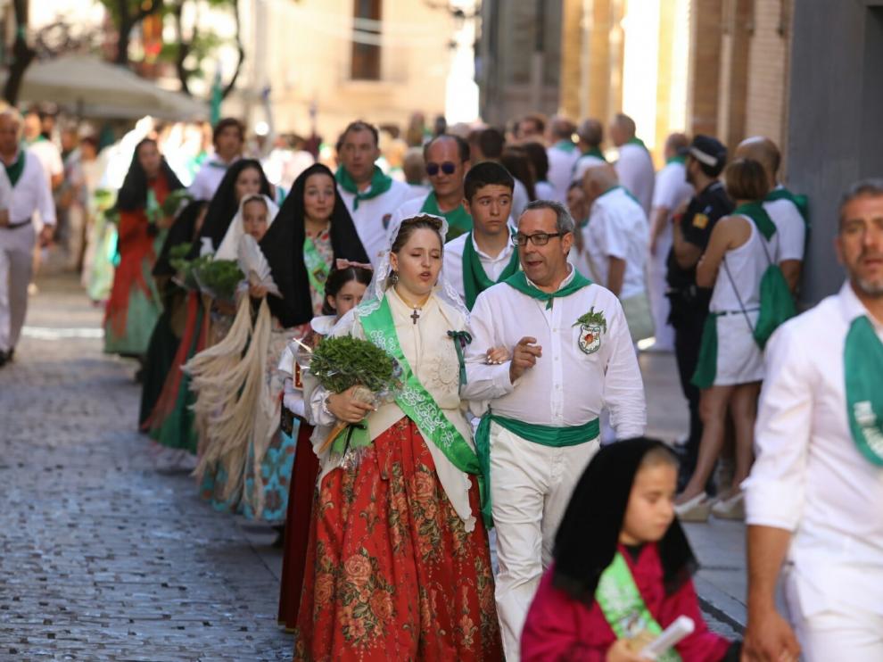 Devoción y política se acaban mezclando en la tradicional procesión de San Lorenzo