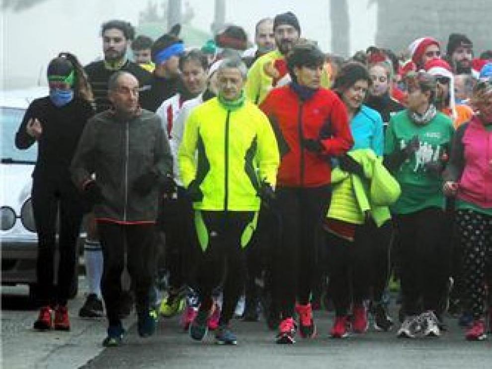 La Carrera de Navidad une de nuevo a los oscenses