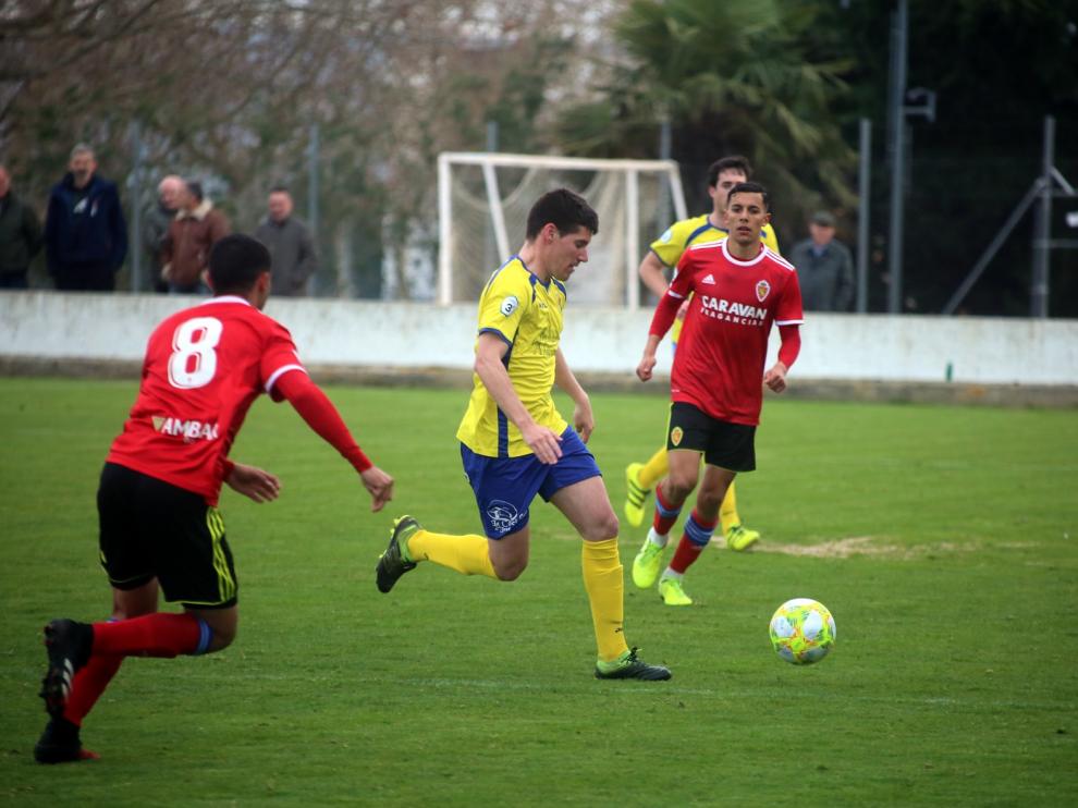 Al Almudévar le sabe a muy poco el empate con el Aragón