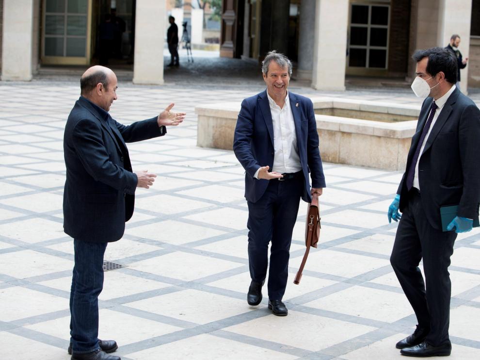 Empresarios y sindicatos piden protección de la COVID-19 para los trabajadores