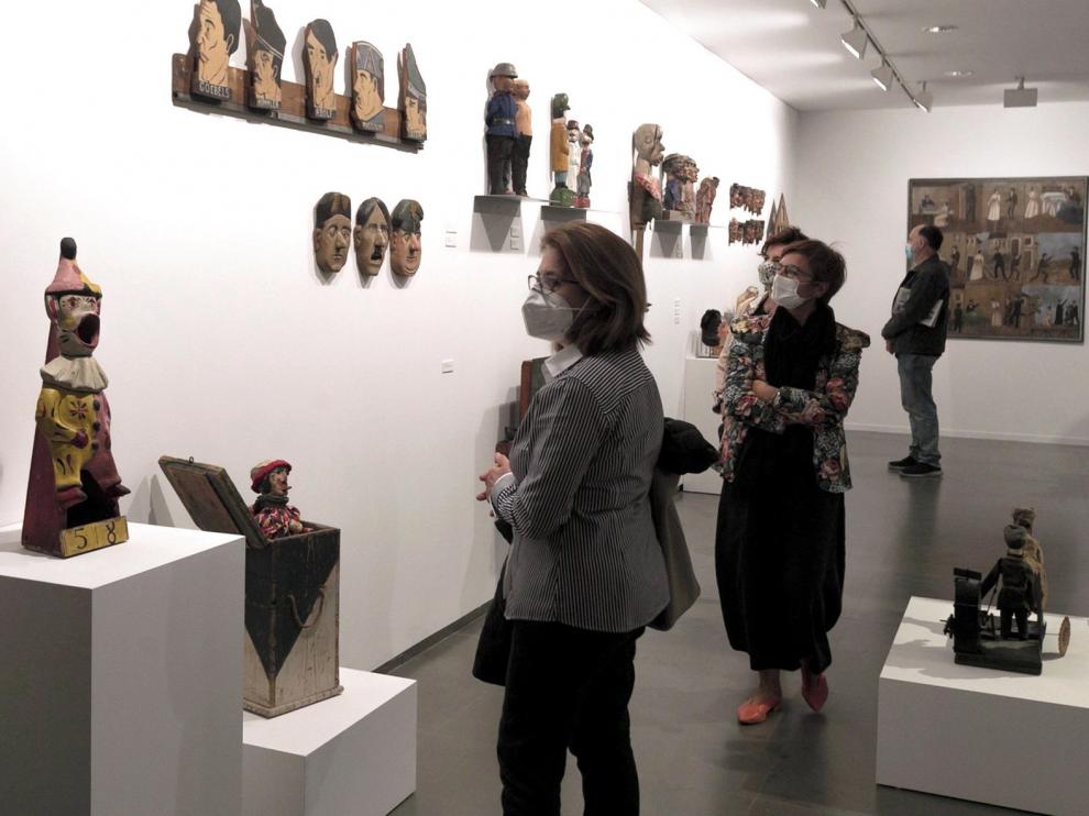 La Diputación de Huesca mantiene las visitas a la exposición 'Arte Ingenuo. Colección Santos Lloro' con aforo del 25%