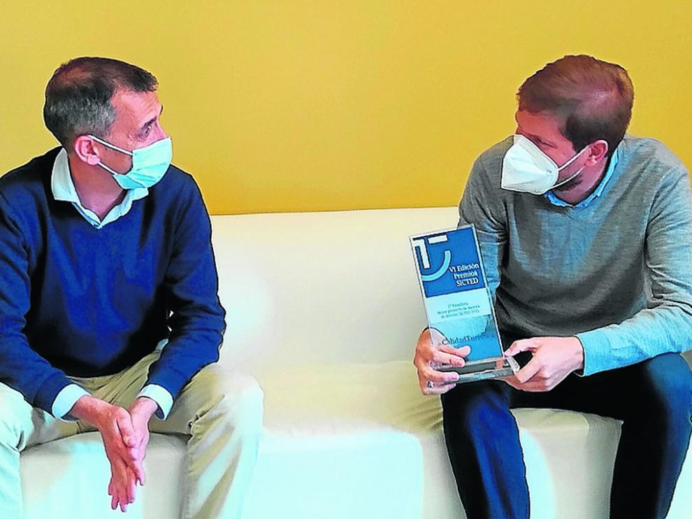 El consultor responsable del Sicted, Marc Pavía y el presidente ribagorzano, Marcel Iglesias.