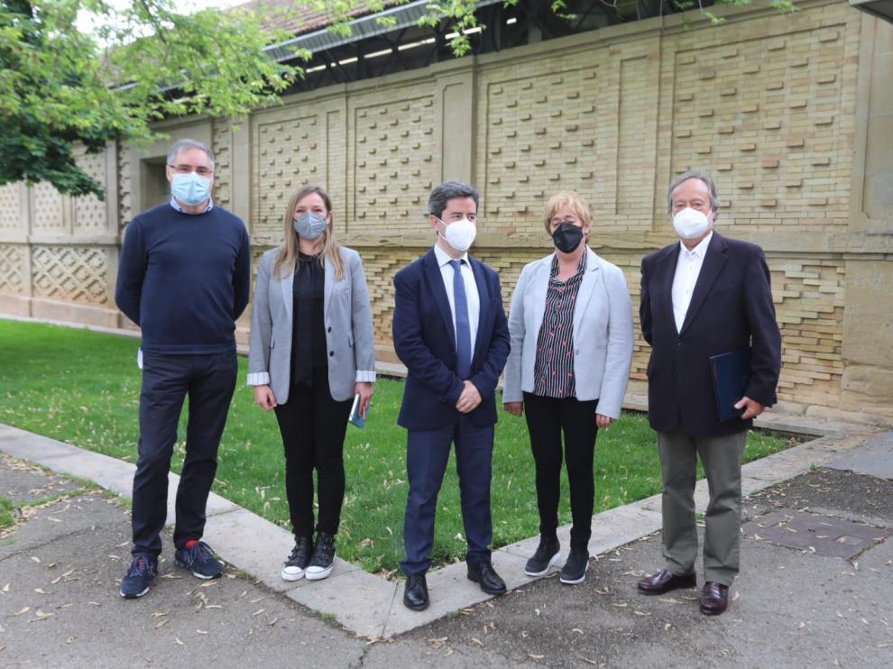 Representantes de las tres entidades que impulsan la candidatura de Huesca.