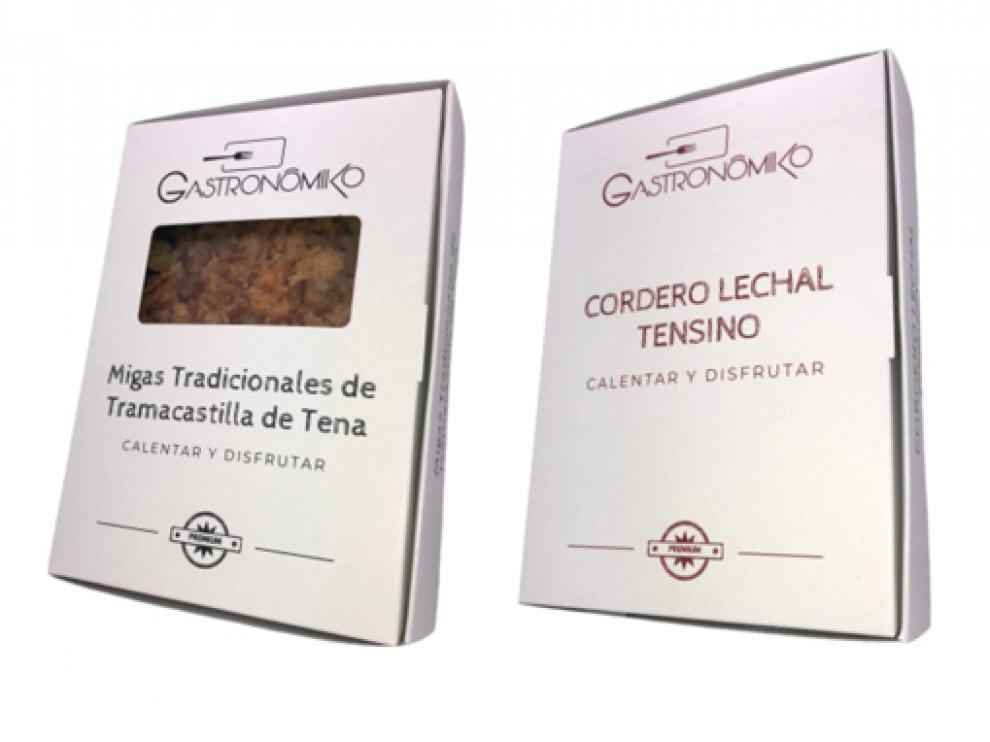Envases en los que se presentan las migas y el Lechal Tensino.