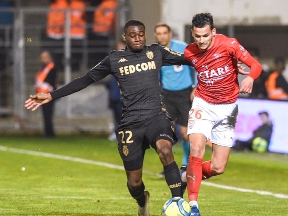 Florian Miguel, a la derecha, en un partido con el Nimes ante el Mónaco