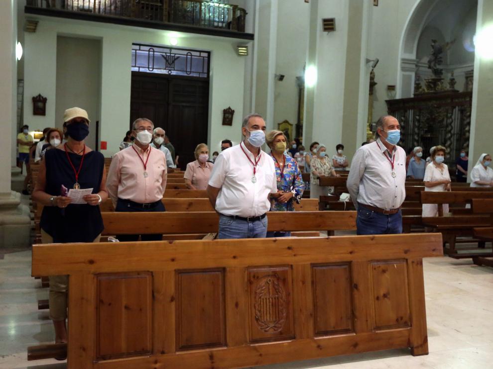 Asistentes a la eucaristía en la Basílica de San Lorenzo