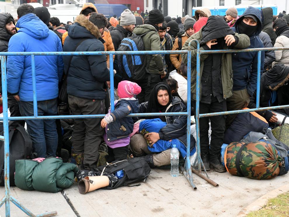 Refugiados en un campamento de migrantes cerca de la frontera bielorrusa-polaca.