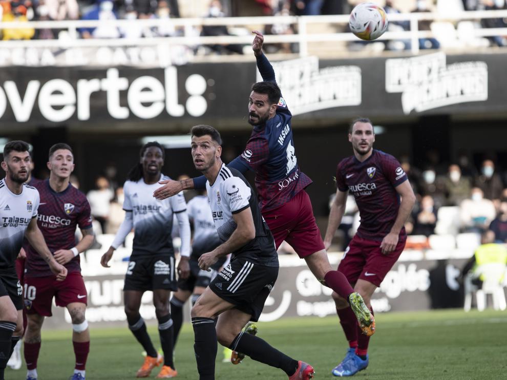 Insua e Ignasi Miquel formaron la defensa del Huesca en Cartagena junto a Florian.